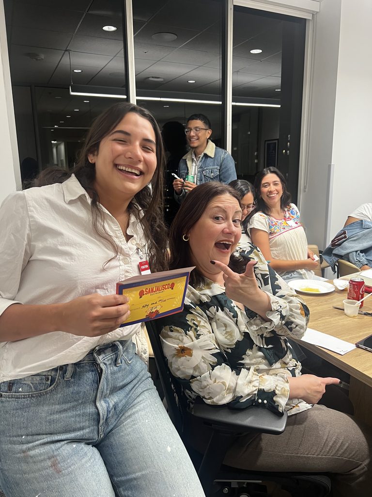 Winner of the raffle holds gift certificate.